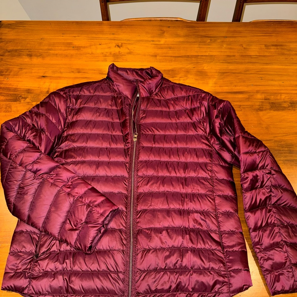 Packable down and feather jacket.  Super lightweight. Burgundy colour.